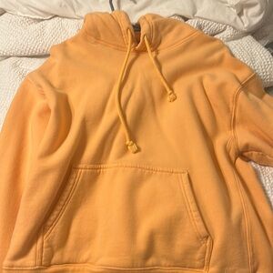 ORANGE TNA HOODIE